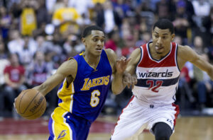 Jordan Clarkson being guarded by Otto Porter