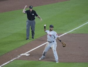 Rafael Devers throwing from third base