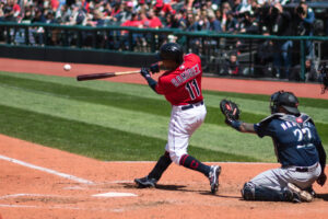 Jose Ramirez hitting a ball